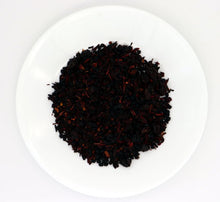Load image into Gallery viewer, Our “Organic Iced Berry” is a herb and fruit tea is imported from Canada, USA, Thailand, and Spain and is made with only premium luxury ingredients.  This tea&#39;s infusion is deep rich reds and purples.   It tastes of a bold full berry flavor with creamy notes and tart character. it comes in a large 1.25 oz. (30 g) bag that conveniently makes a large gallon of delicious iced tea. 
